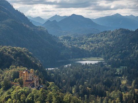 09/24/2020 Schwangau, Bavaria, Germany.
High angle view of the castle and surrounding nature.
Th Alps on the background