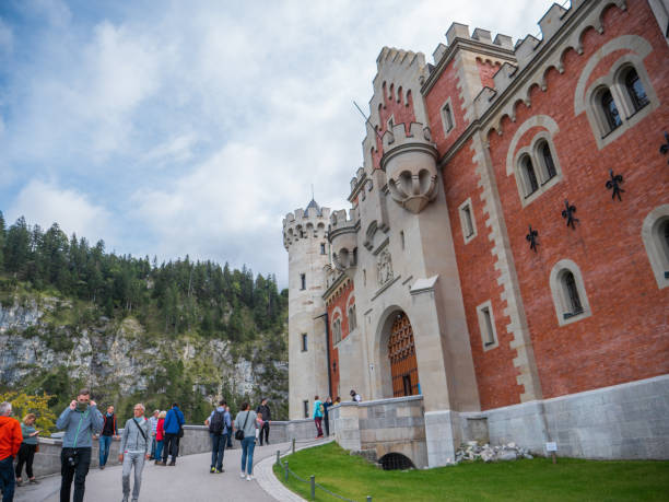 09/24/2020 Schwangau, Bavaria, Germany.Tourists visiting Neuschwantein castle in Germany, front view
