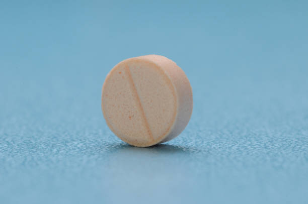 istock Pink tablet or fill of medicine 1316418584
