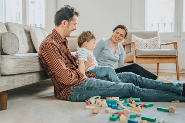 istock Family playing with toddler 1316419184