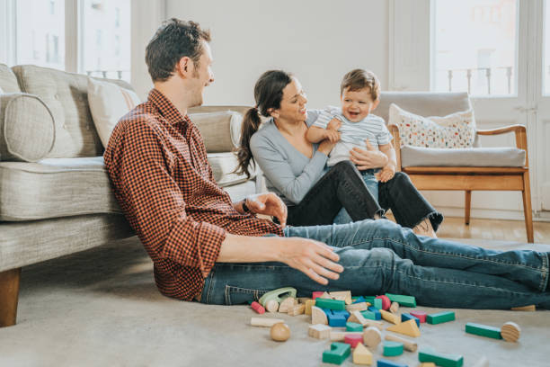 istock Family playing with toddler 1316419201