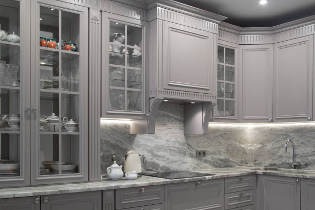 istock Modern beige and grey colored kitchen interior classic style with marble countertop in luxury apartment 1316419550