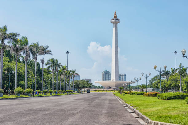 Jakarta city in the daytime National Monument in Jakarta city merdeka square stock pictures, royalty-free photos & images