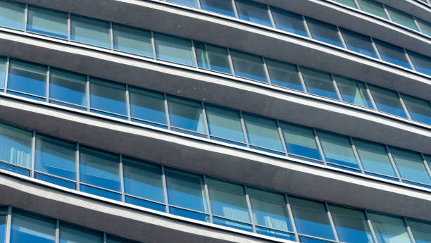 istock Fragment of a modern building. Modern architecture design. Structural glass facade of modern office building. Abstract architecture fragment. Architecture concept. 1316420349