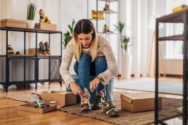 istock Woman trying on shoes 1316420909