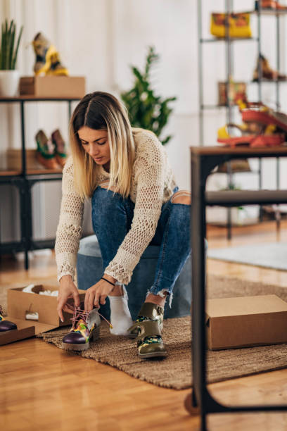 istock Woman trying on shoes 1316420923