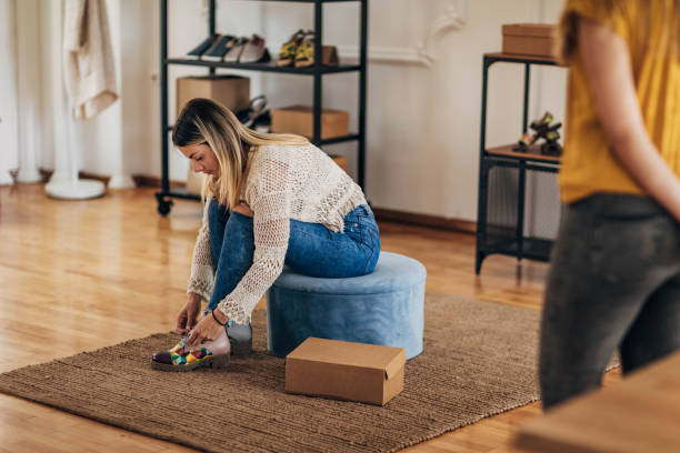 istock Woman trying on new shoes 1316422964