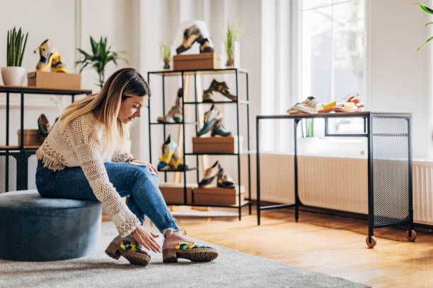 istock Woman buying shoes 1316422977