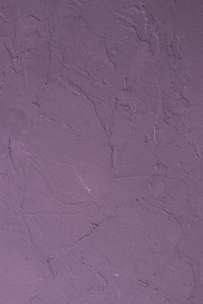 istock Vertical photography light purple plastered wall. Purple stucco background. 1316428041