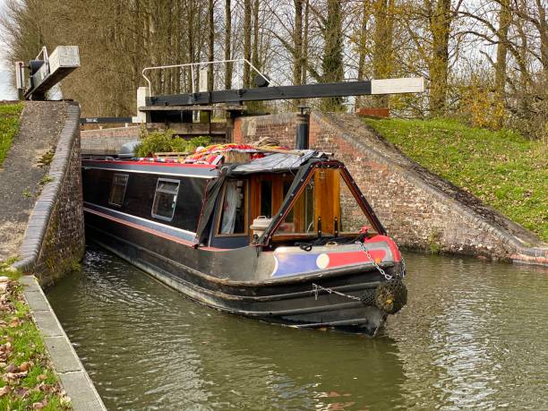 istock Narrowboat coming out of a lock 1316428412