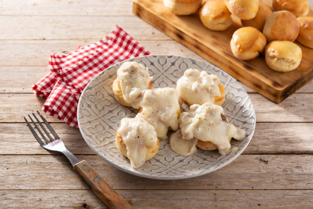 istock Traditional American biscuits and gravy for breakfast 1316429170