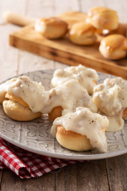 istock Traditional American biscuits and gravy for breakfast 1316429189
