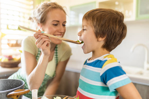 istock Boy enjoys a freshly cooked lunch 1316431137