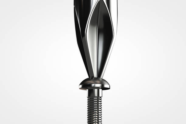 istock Tightening the screw with a screwdriver. Close-up 1316437084