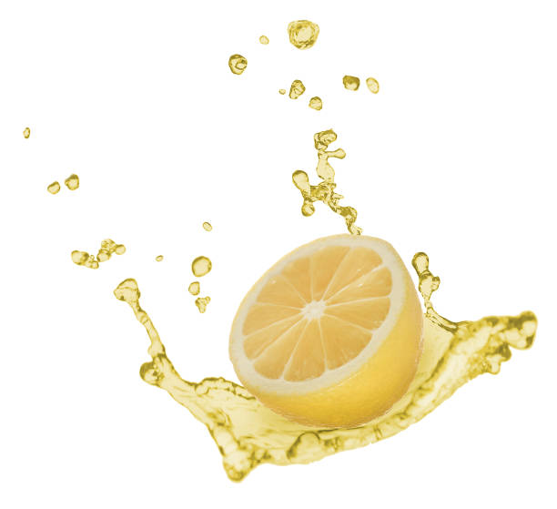 istock Lemon and splash of juice on white background 1316440252