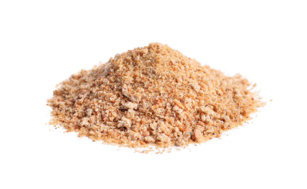 istock Pile of fresh bread crumbs isolated on white 1316440607