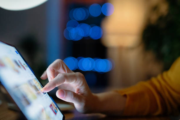 istock Woman touching digital tablet at home 1316440656