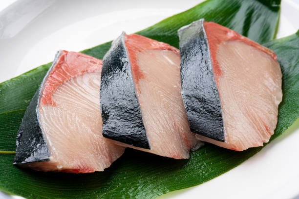 istock Yellowtail fillet on white background 1316442140