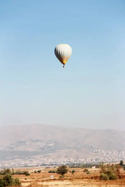 Balloon for aeronautics on the background of a mountains