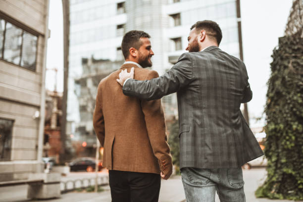 istock Gay Men Embracing And Taking A Walk Together 1316445633