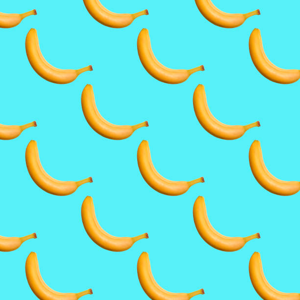 istock Banana seamless pattern isolated on blue background. Sweet fruit food background. 1316447442