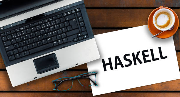 istock Word Haskell on paper and laptop on desk 1316449182