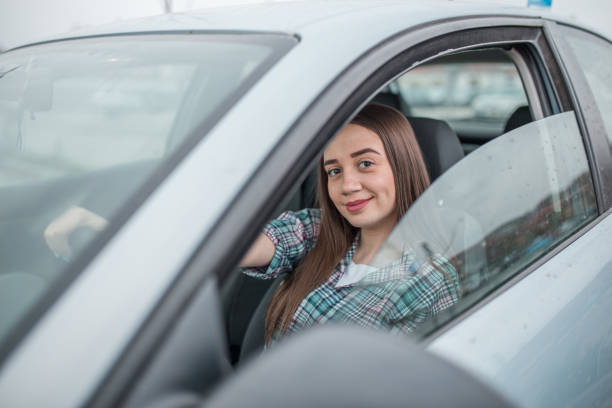 istock Experienced female driver in a car 1316450316