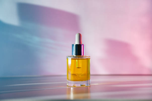 istock Yellow face oil on light pink and blue background 1316451107