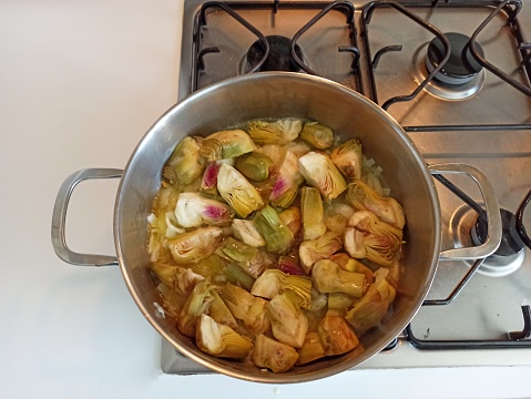 Cooking turkish artichoke heart dish in Istanbul turkey