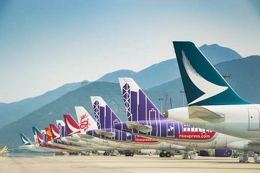 Hong Kong, March 2021, Aircrafts from different airlines parked at Hong Kong International airport due to COVID-19, huge impact to aviation industry