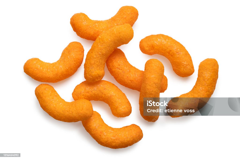 Cheese puffs Extruded cheese puffs isolated on white. Top view. Cheese Puff Stock Photo