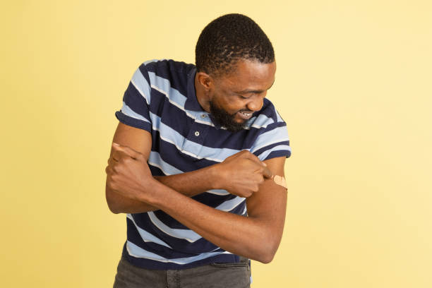 istock One African young man posing isolated over yellow studio background with copyspace for ad 1316458376