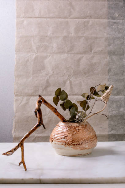 istock Dry flowers and twigs branch in ceramic vase 1316460317