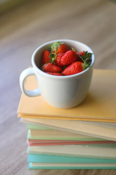 istock Strawberries and Books 1316460379