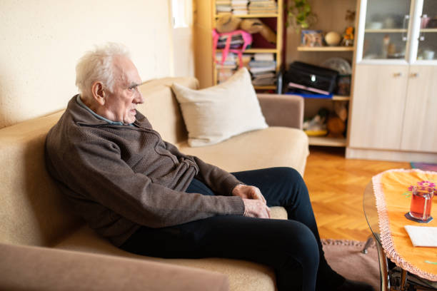 istock Senior man siting in living room 1316460444