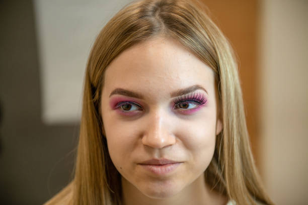Portrait of a girl with light makeup and styled blond hair