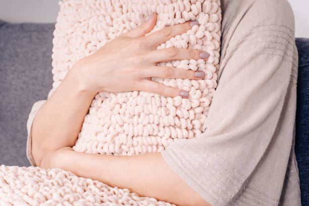 istock Knits made from thick soft yarn. Soft knitted cushions made of thick yarn. 1316464467