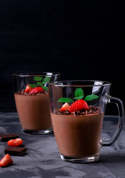 istock Chocolate mousse topped with strawberry and mint 1316465103