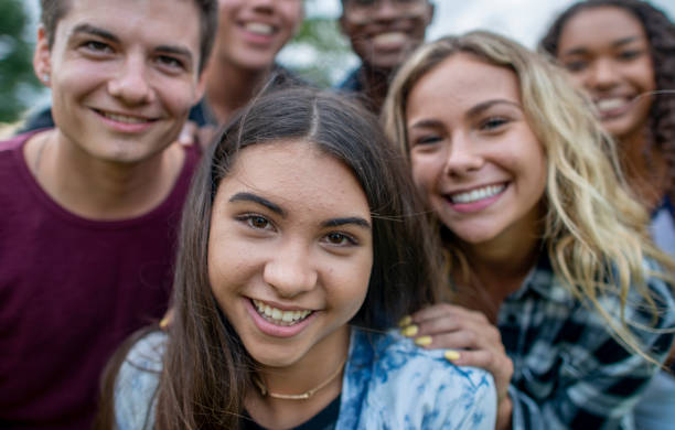 istock Smiling Teenagers 1316465912