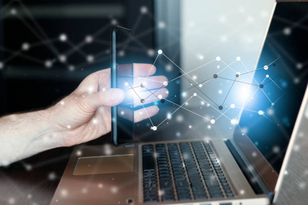 istock phone and laptop web connections 1316469296