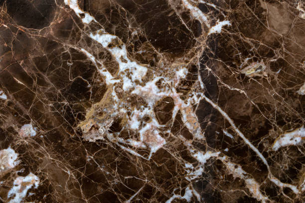 istock Abstract pattern of brown marble close-up. Natural background, texture. 1316472812