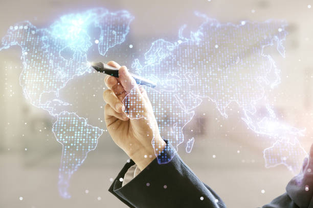 istock Multi exposure of man hand with pen working with abstract graphic world map on blurred office background, connection and communication concept 1316474328