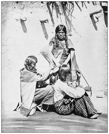 Antique black and white photograph of American landmarks: Moqui Natives, Winslow, Arizona