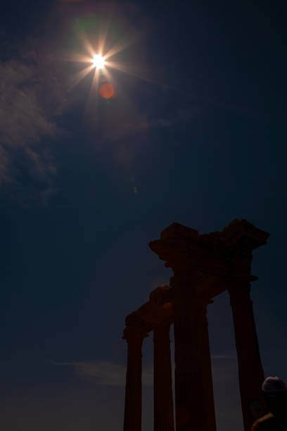 istock Solar Eclipse with Filter at Side, Antalya in Turkey. Temple of Apollo. 1316480023