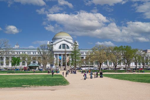 Founded in 1846, the Smithsonian is the world's largest museum and research complex, consisting of 19 museums and galleries. Sightseeing Tourists riding Segway scooters on gravel footpath in front of the Smithsonian museum of Natural History.