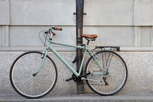 light green vintage bicycle with leather saddle