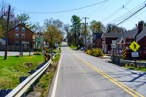 Unionville, PA, USA - April 6, 2021: The main road, known as Route 82, through the community of Unionville in southern Chester County, PA.