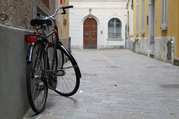 istock black bicycle leaning against the silent ancient city 1316491188