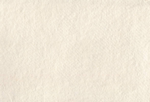 Handmade white empty paper Handmade structured paper as background. A color between white and ecru. handmade paper stock pictures, royalty-free photos & images