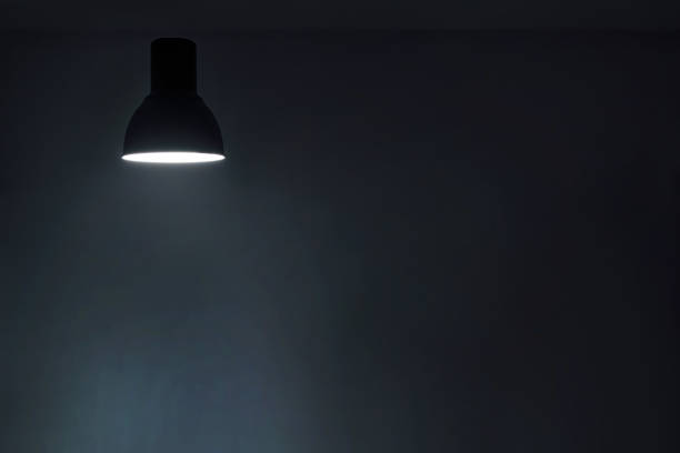 istock a shining levitating hanged ceiling lamp without electric wire  with dark blue tone dirty concrete background wall 1316492843